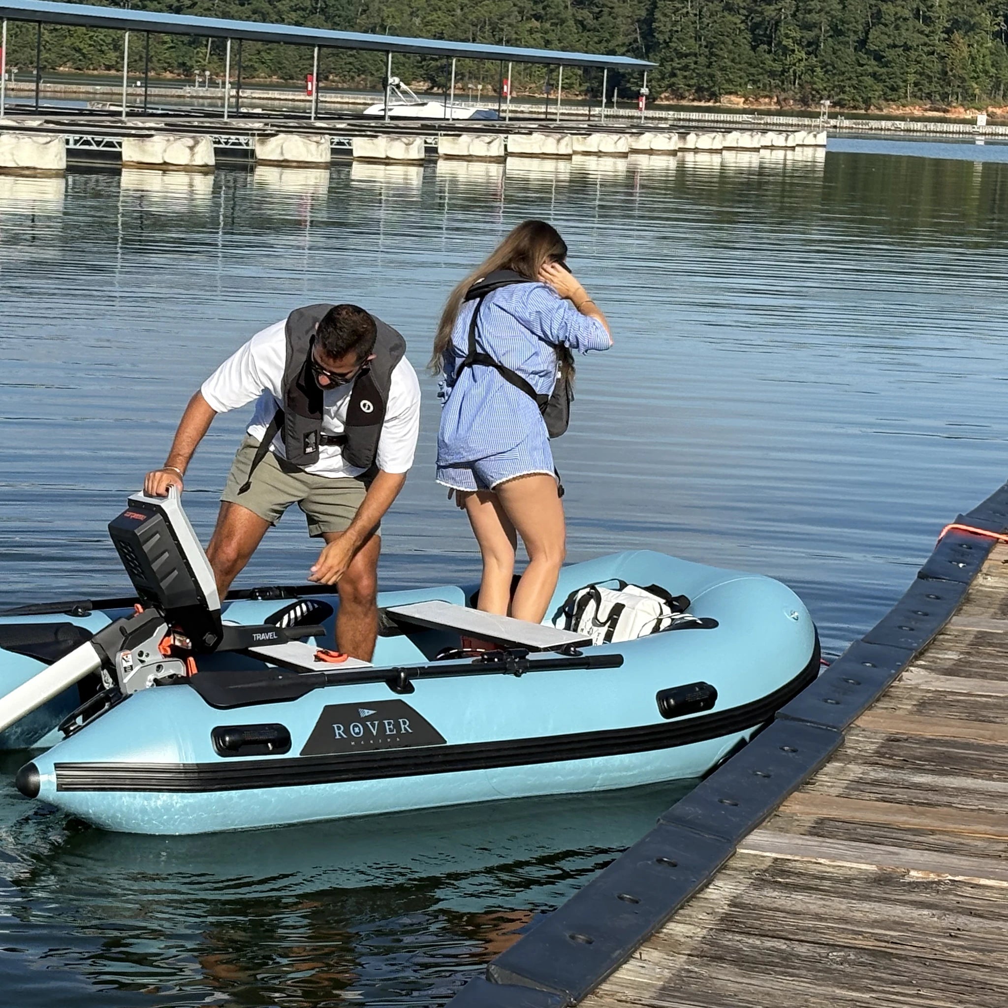 Battle Boat 10ft paired with Torqeedo Travel electric outboard motor, boarding