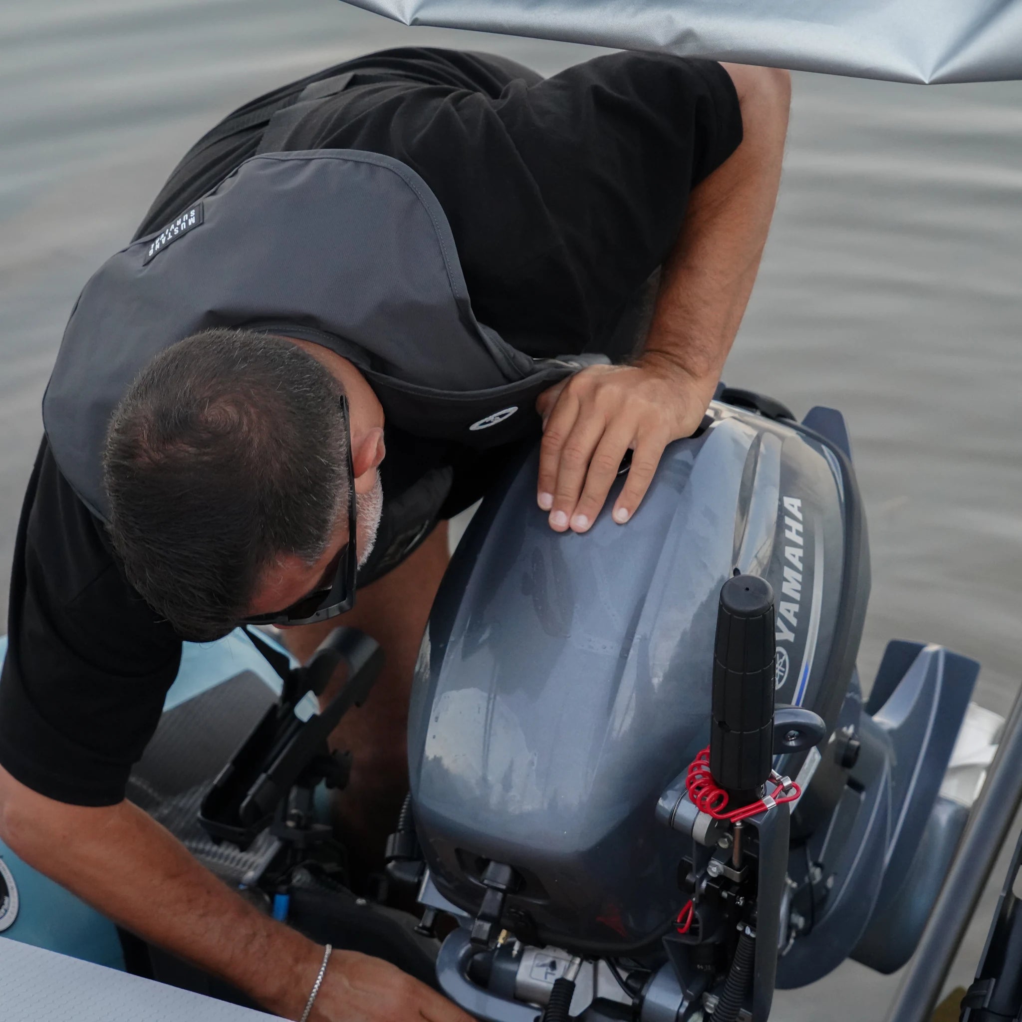 Battle Boat 12ft paired with Yamaha 9.9HP outboard motor, motor detail